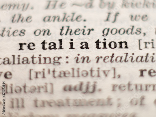 Фотография Dictionary definition of word retaliation, selective focus.