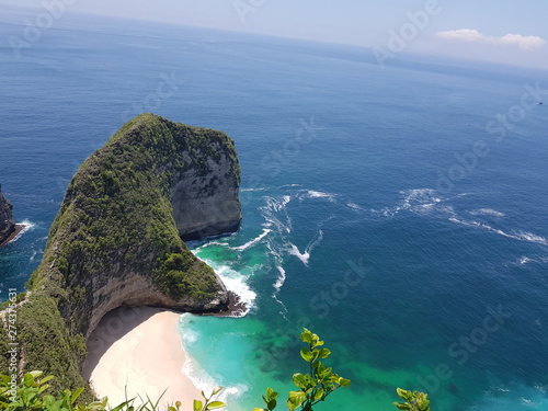 The overview photo on the T-Rex shape island with a pristine white sand in Bali Indonesia 