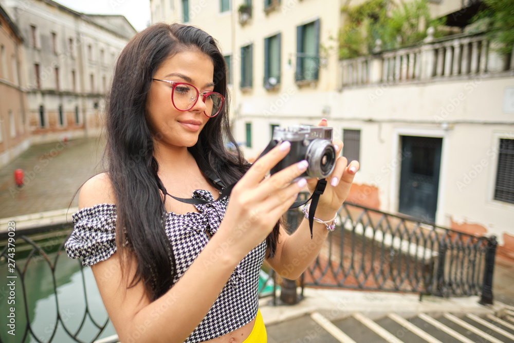 Smiling woman Tourist Takes Photos In Italy Smiling woman Tourist Takes Photos In Italy