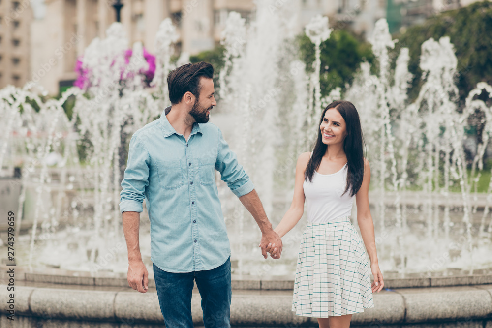 Portrait of cute charming lovely spouses married people have first sight acquaintance outside town bearded centre cheerful fun free time vacation weekend beautiful dress shirt denim jeans