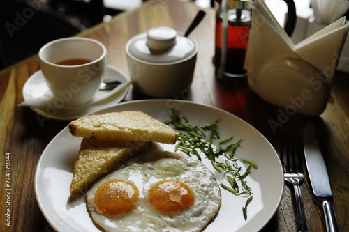 breakfast with fried eggs and bacon