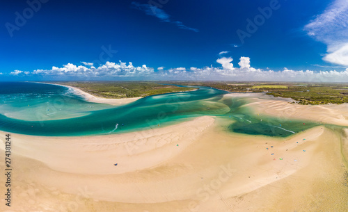 фотографія Drone view of Elliott Heads Beach and River, Queensland, Australia