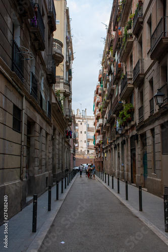 Barcelona, Spain - 25th July 2017 - Long street with posts leading into the uknown