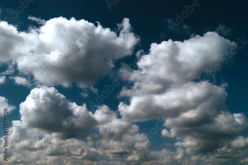 Heavenly abyss, blue sky and cumulus clouds