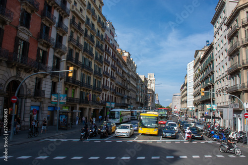 Barcelona, Spain - 26th July 2017 - Busy street with people crossing road