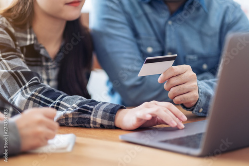 Businessman using credit card for purchasing and shopping online