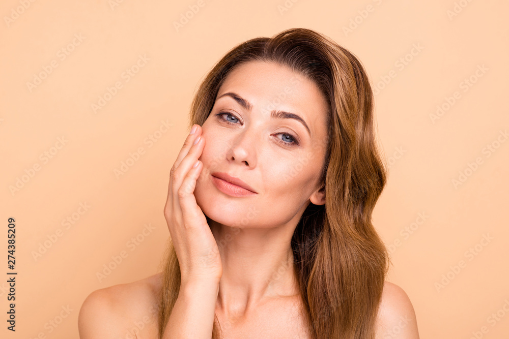 Close up photo beautiful amazing mature she her lady overjoyed after salon spa procedures aesthetic pretty ideal appearance nude arm hand palm touch cheek perfection isolated pastel beige background Close up photo beautiful amazing mature she her lady overjoyed after salon spa procedures aesthetic pretty ideal appearance nude arm hand palm touch cheek perfection isolated pastel beige background