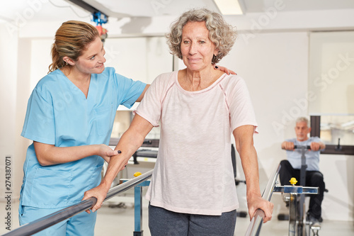 Senior woman exercising in rehab photo