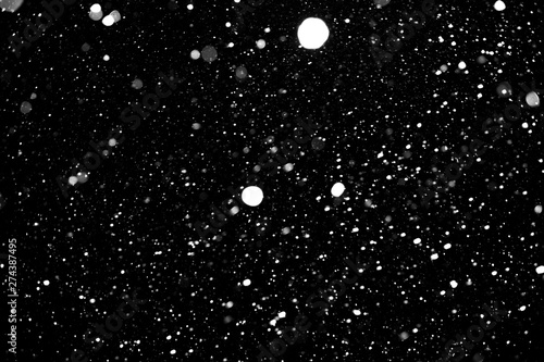 snow on a black background, snowfall, white spots on a black background
