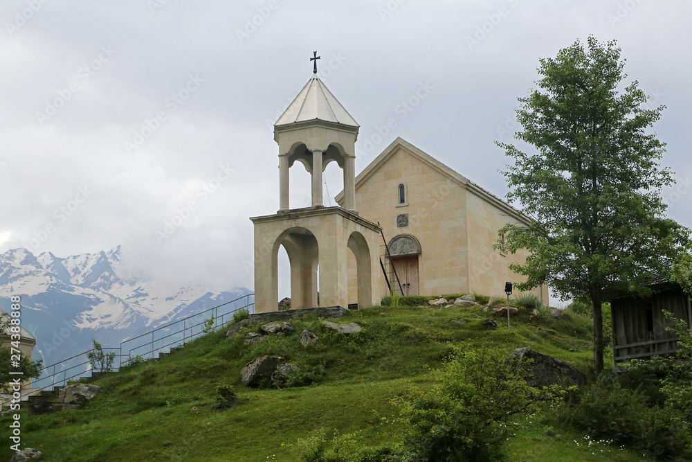 View of the chapel of the monastery of St. Illarion in the village of Mestia in the region of Verhnia Svaneti, Georgia.