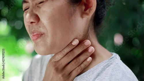 Sick Young Woman Feeling Bad Suffering From Throat Pain, Sore Throat ,Painful Swallowing , Health Concept.