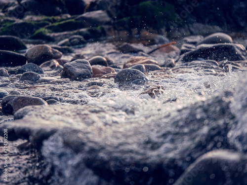 Flowing water texture. Cool tone  Concept  speed  power of nature  unique.