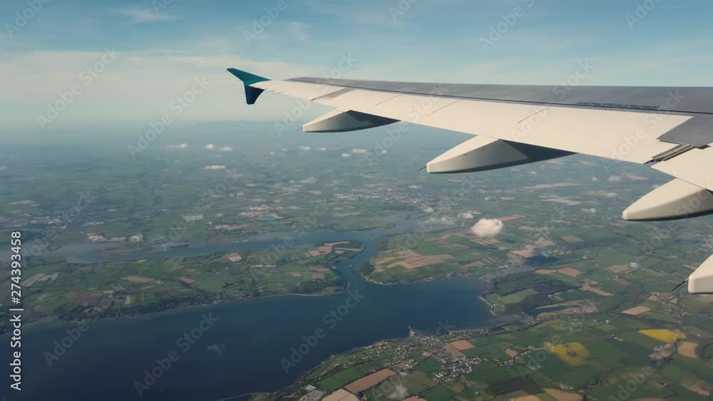 Airplane wing and Irish landscape Airplane wing and Irish landscape