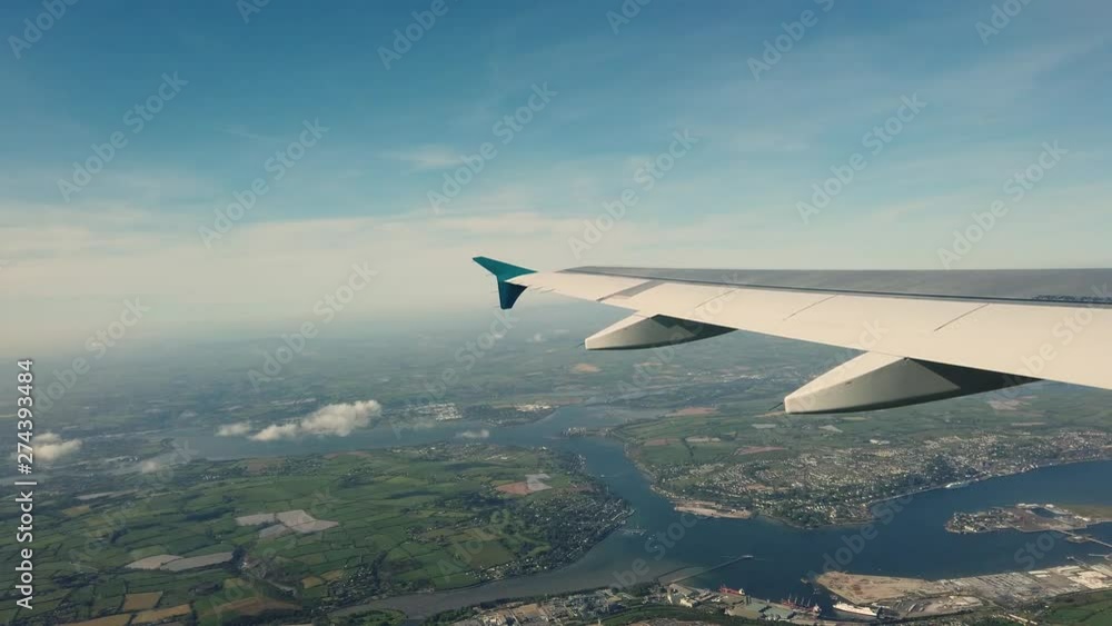 Airplane wing and Irish landscape Airplane wing and Irish landscape
