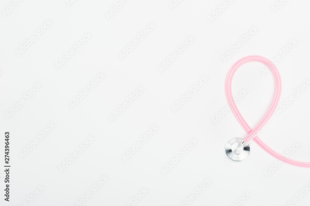 top view of stethoscope on white background with copy space, breast cancer concept top view of stethoscope on white background with copy space, breast cancer concept