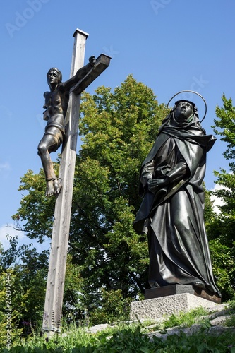 Cross and holy figure, Calvary, Bad Tolz, Upper Bavaria, Bavaria, Germany, Europe photo
