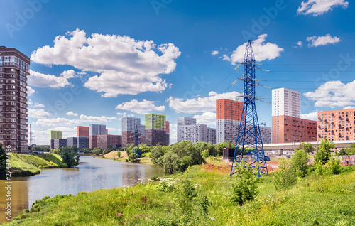 Moscow. June 19, 2019. New residential complexes: Tatianin Park and Meshchersky Forest. Beautiful cityscape from the bank of the Setunka River.