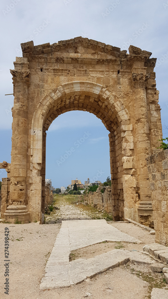 The Triumphal Arch. Roman archaeological remains in Tyre. Tyre is an ancient Phoenician city. Tyre, Lebanon - June, 2019