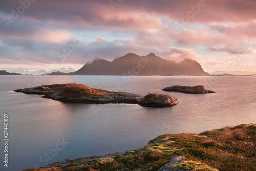 Sunset on Most Scenic Beaches Beautiful landscape of Vestvagoy in the evening, dramatic pink sky, part of Lofoten island, Arctic Circle, Nordland, Norway, Scandinavia