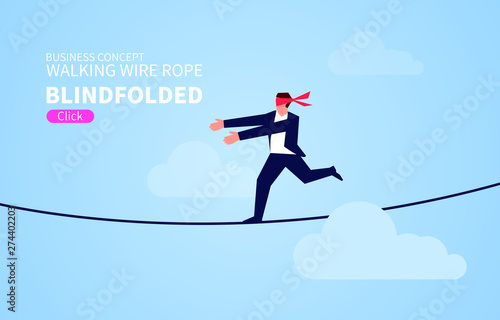 Businessman blindfolded Walking wire rope