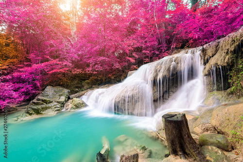 Amazing in nature  beautiful waterfall at colorful autumn forest in fall season