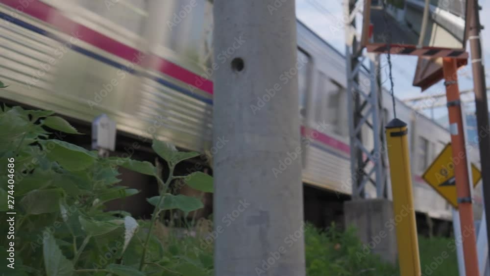 A panning shot of a train passing by. A panning shot of a train passing by.