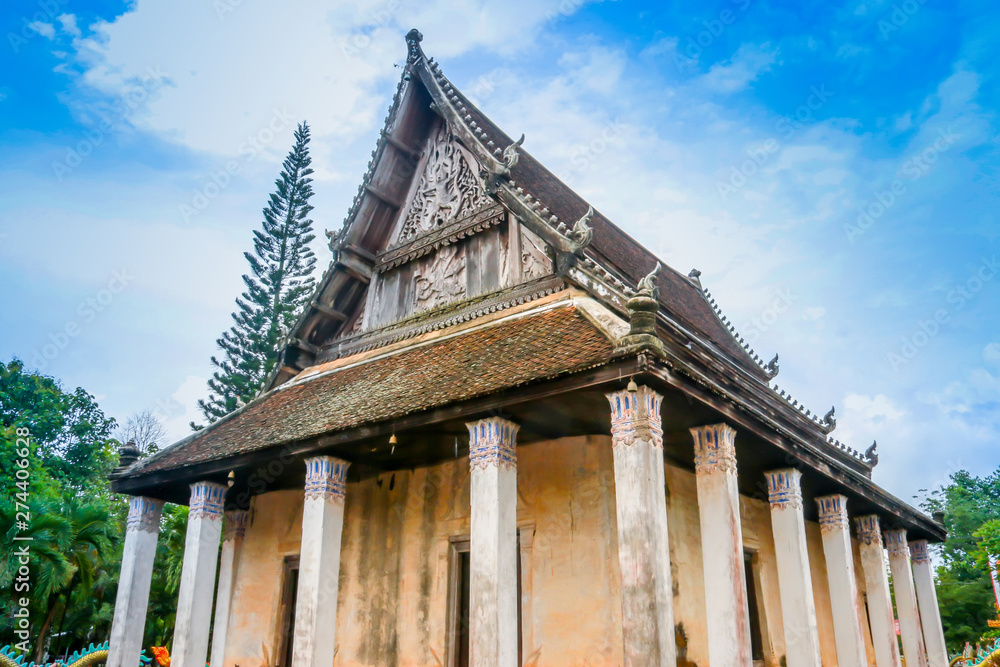 Old church isosceles made of wood on blue sky background Old church isosceles made of wood on blue sky background