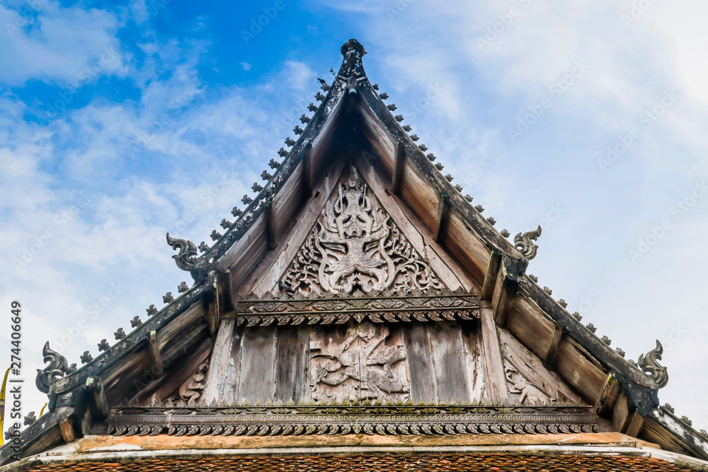 Old church isosceles made of wood on blue sky background Old church isosceles made of wood on blue sky background