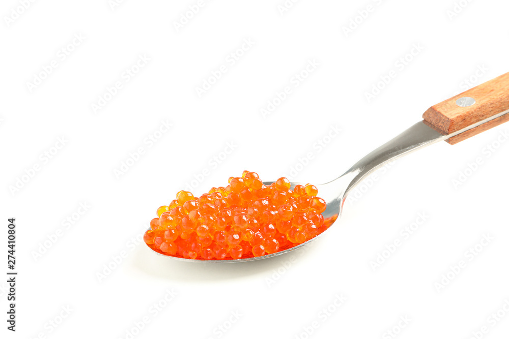 Spoon with red caviar isolated on white background, closeup Spoon with red caviar isolated on white background, closeup