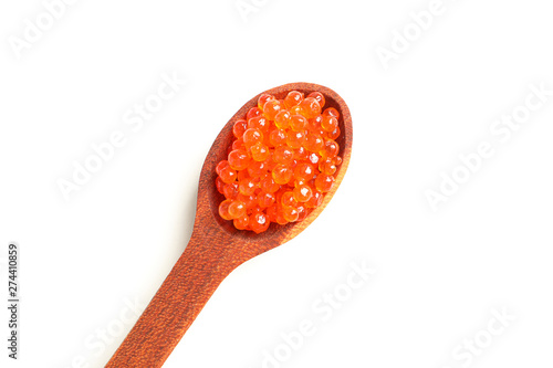 Spoon with red caviar isolated on white background, top view