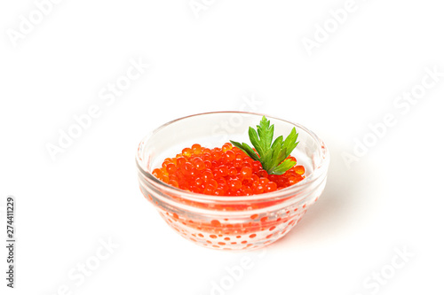 Glass jar with caviar isolated on white background
