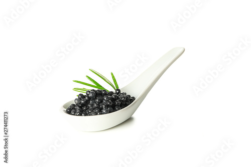Glass spoon with caviar isolated on white background