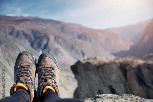 Feet Hiker relaxing enjoying view outdoor. Travel Lifestyle concept adventure vacations outdoor.