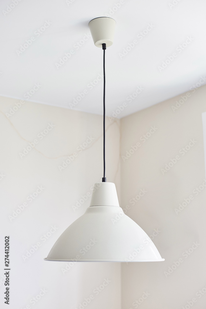 White lamp in the interior of the kitchen. White lamp in the interior of the kitchen.
