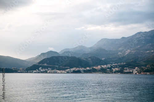 Beautiful views of the mountains, the sea and the city of Budva in Montenegro. The city is among the natural landscape.