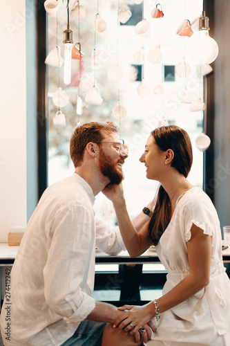 Loving couple in a coffee shop © diignat
