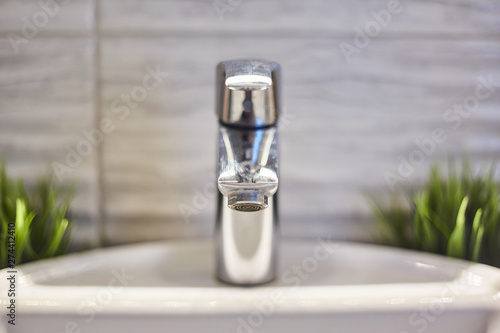 Water tap in the bathroom. close-up