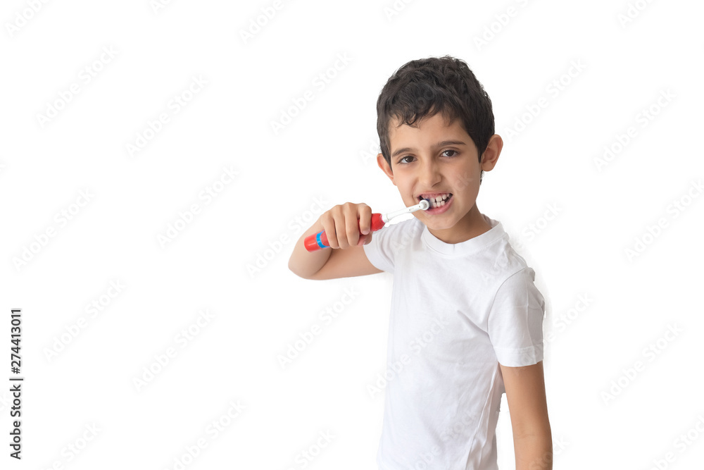 Boy brushing teeth isolated on white background. Teenager. Child with toothbrush. Boy brushing teeth isolated on white background. Teenager. Child with toothbrush.
