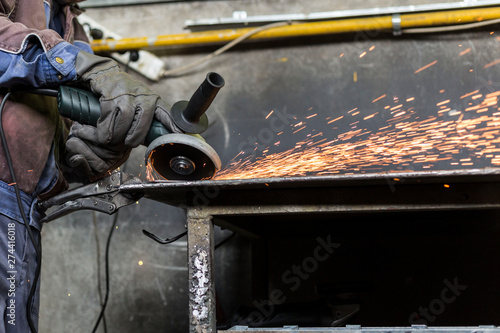 Grinding of materials in metallurgy workshop