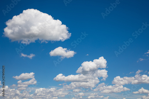 Photography White, fluffy clouds in blue sky. Background from clouds.