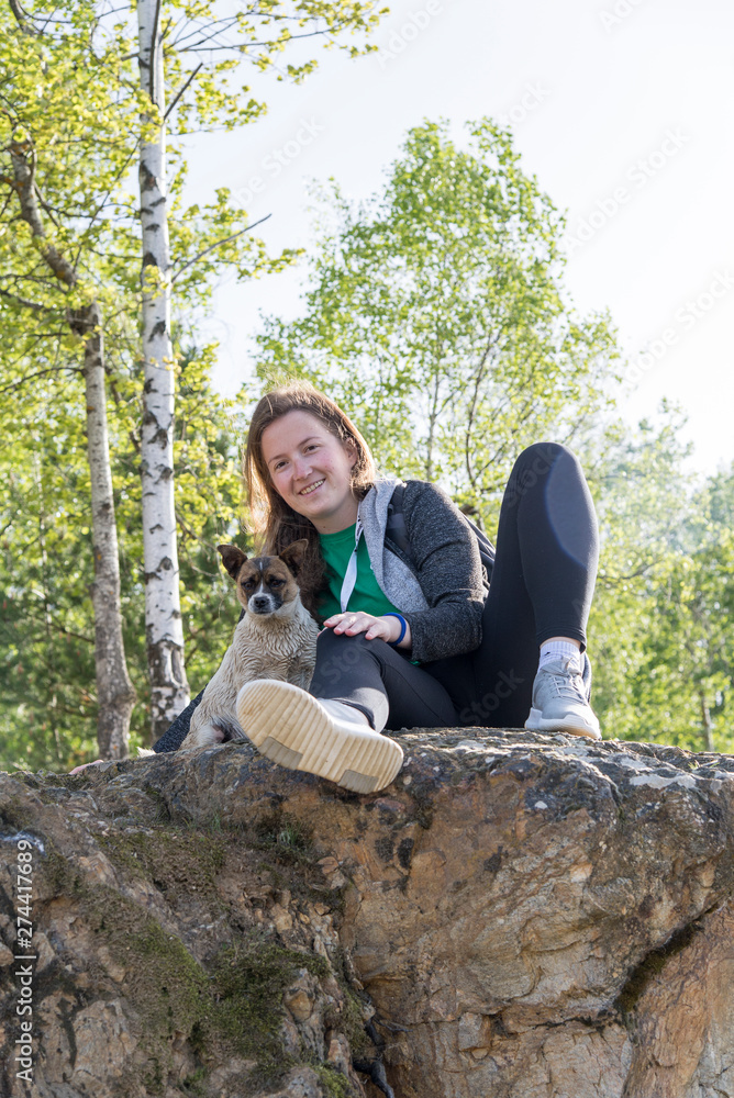 Obraz premium Young woman in the park