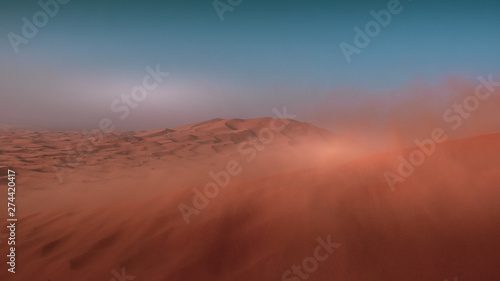 Landscape view of yellow sand and clear blue sky during the windy weather. Sahara, Morocco.