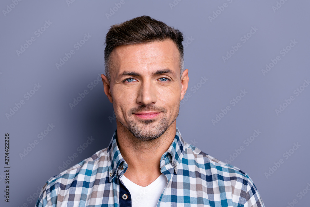 Close-up portrait of his he nice-looking attractive well-groomed cheerful bearded guy wearing checked shirt isolated over gray blue pastel background Close-up portrait of his he nice-looking attractive well-groomed cheerful bearded guy wearing checked shirt isolated over gray blue pastel background