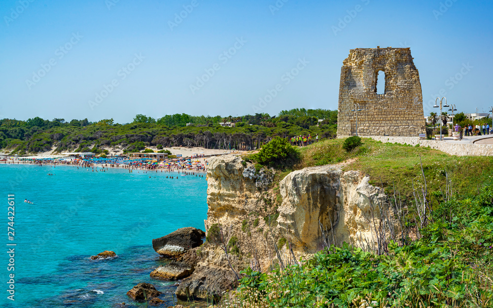 Holiday in Apulia. The bay of Torre dell'Orso, with its high cliffs, in Salento, Puglia, Italy.