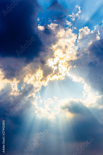 Sunshine in clouds on blue sky After rain