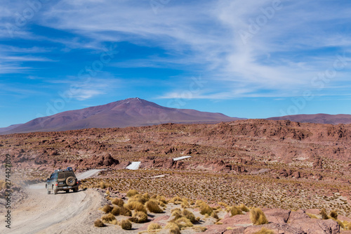Background with barren desert scenery in the Bolivian Andes, in the Nature reserve Edoardo Avaroa photo
