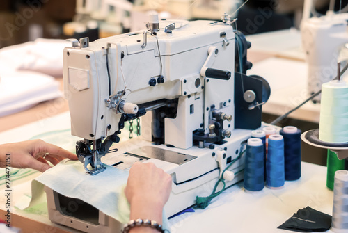 industrial overlock sewing machine in work