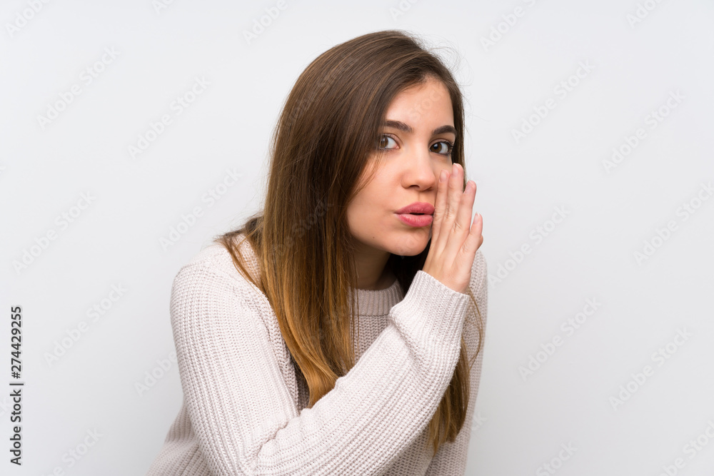 Young girl with white sweater whispering something Young girl with white sweater whispering something