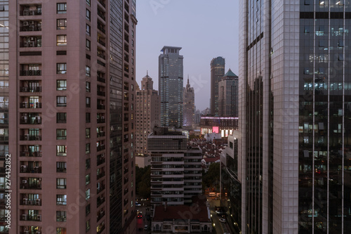 Aerial view of business area and cityscape in the dusk  West Nanjing Road  Jing  an district  Shanghai
