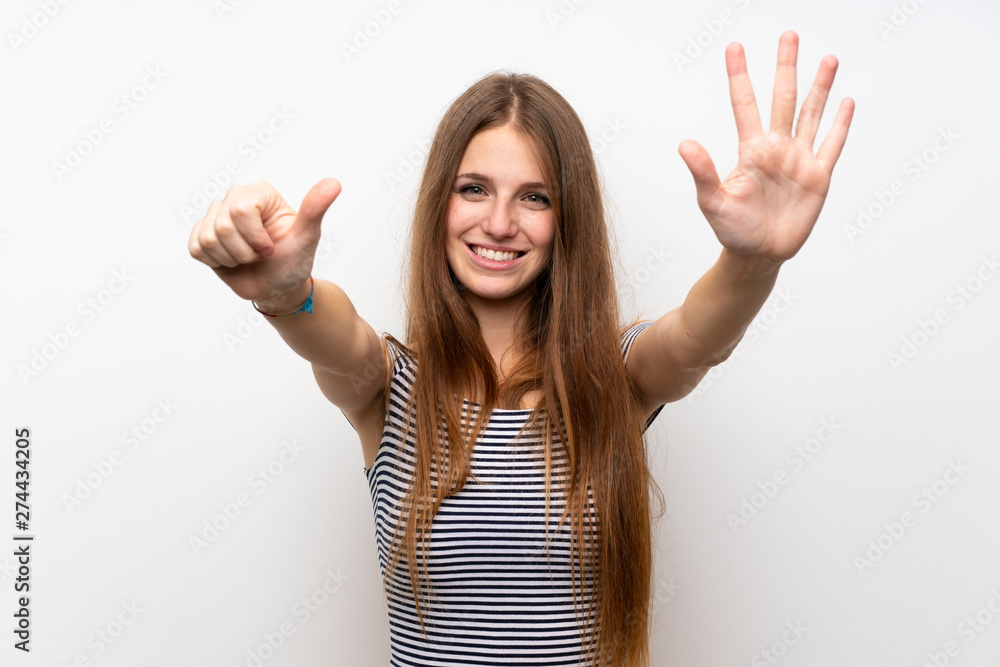 Young woman with long hair over isolated white wall counting six with fingers Young woman with long hair over isolated white wall counting six with fingers